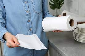 Image of woman using paper towels