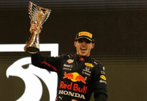 Verstappen holding his trophy