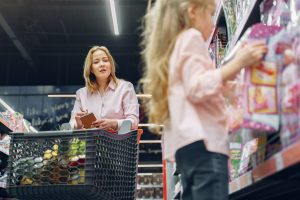 Women shopping with child to demonstrate deconstructing gendered messages