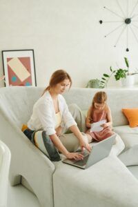 Image of mom working next to daughter to show career planning for the empty nest
