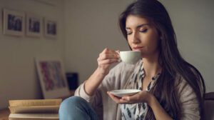 Woman drinking tea to show the benefits of space