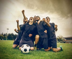 Photo of soccer team celebrating