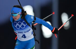 Female biathlete performing in Olympics in inspirational performance