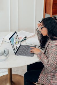 Woman at computer working to show there is no right way to be a woman