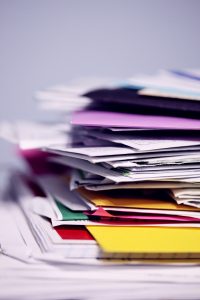 Stack of papers to represent office housework