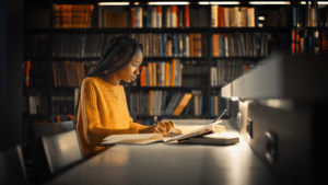 College student studying in the library