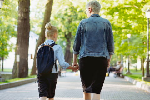 Mom walking child to drop off to symbolize the benefits of space